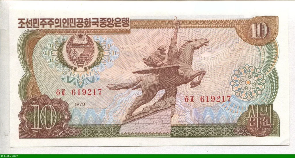 10 Won Statue équestre ailée Chŏllima à Pyongyang et armoiries nationales