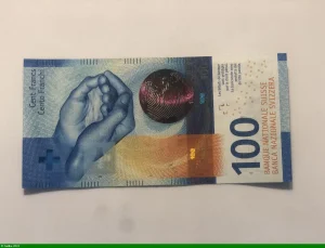 100 Francs Main & Globe