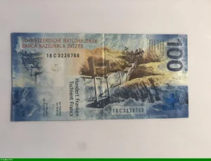 100 Francs Main & Globe