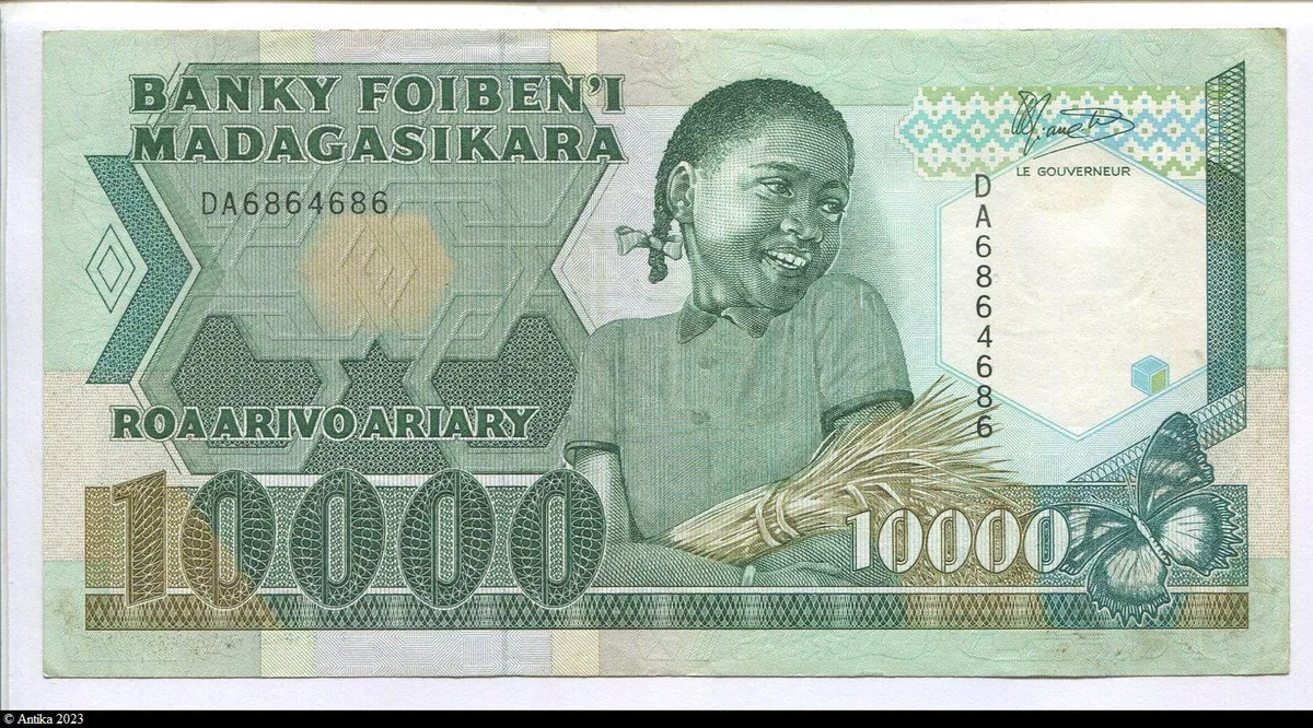 10000 Francs / 2000 Ariary Fillette tenant une gerbe de riz
