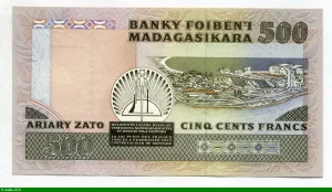 500 Francs/ 100 Ariary Enfant tenant un filet de Poissons